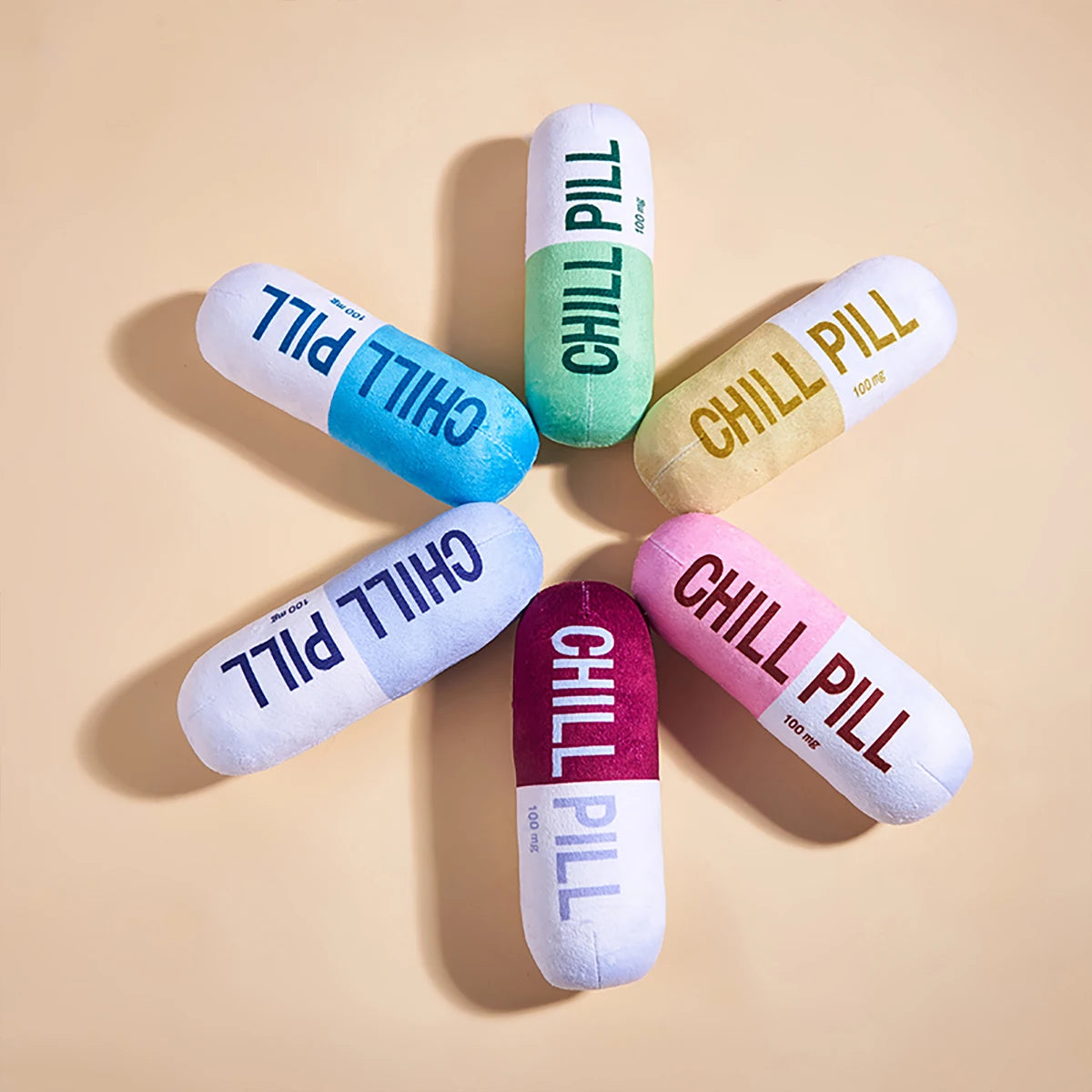 Interactive Plush Pill-Shaped Dog Toy with Squeaker - Durable, Bite-Resistant Chew Toy for Pet Play and Dental Health