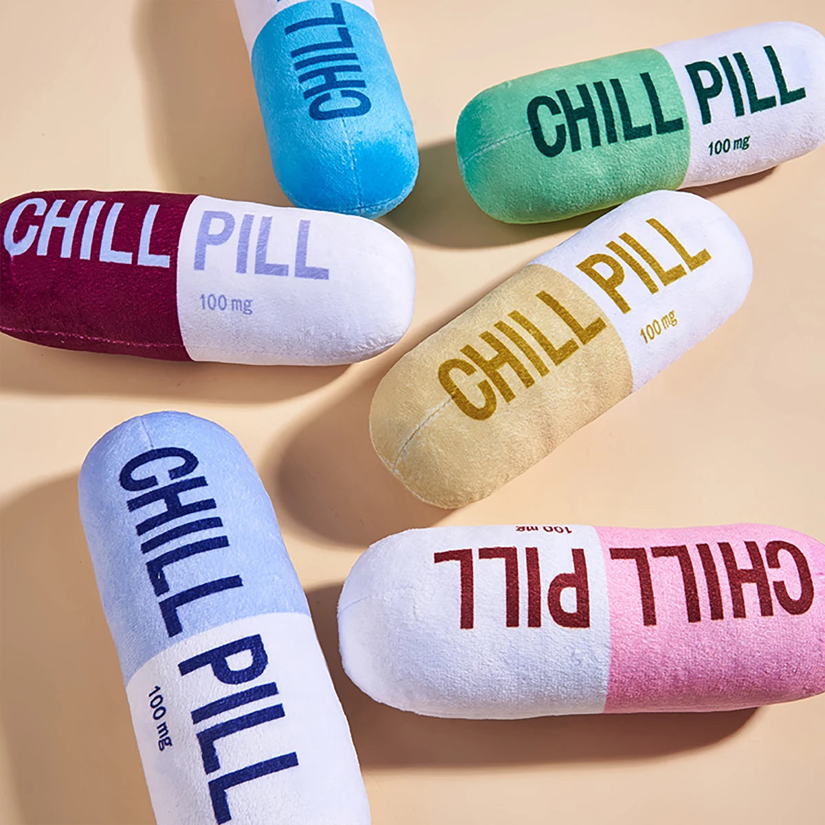 Interactive Plush Pill-Shaped Dog Toy with Squeaker - Durable, Bite-Resistant Chew Toy for Pet Play and Dental Health
